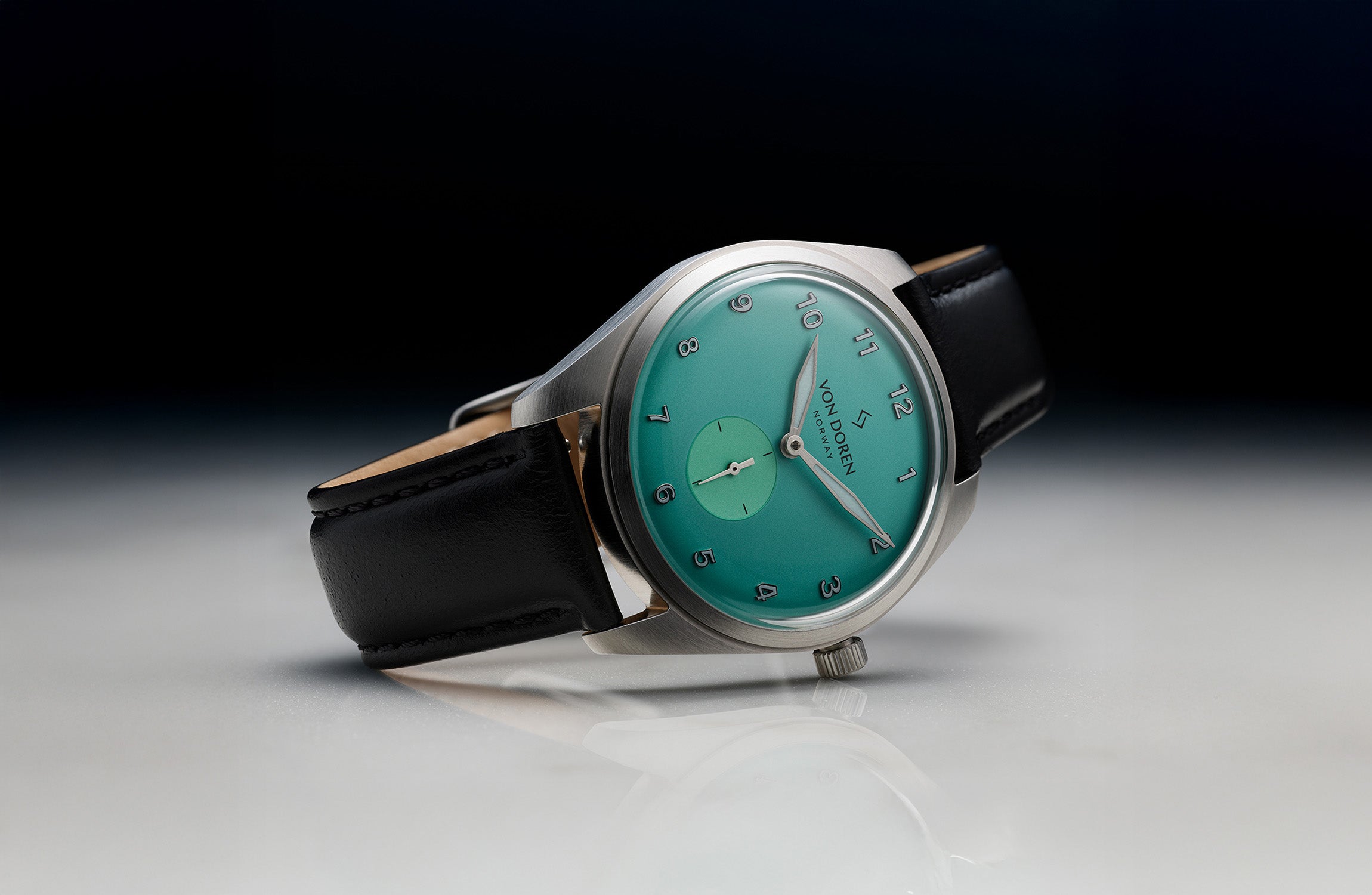 Von Doren Runde Candy Mint watch with mint dial and black leather strap.