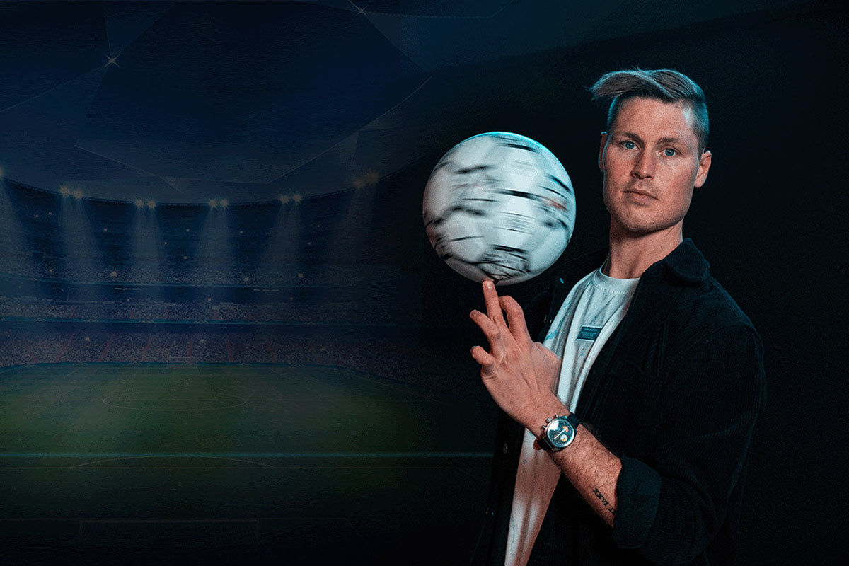 Tobias Becs spinning a football in a stadium setting while wearing a Von Doren watch.